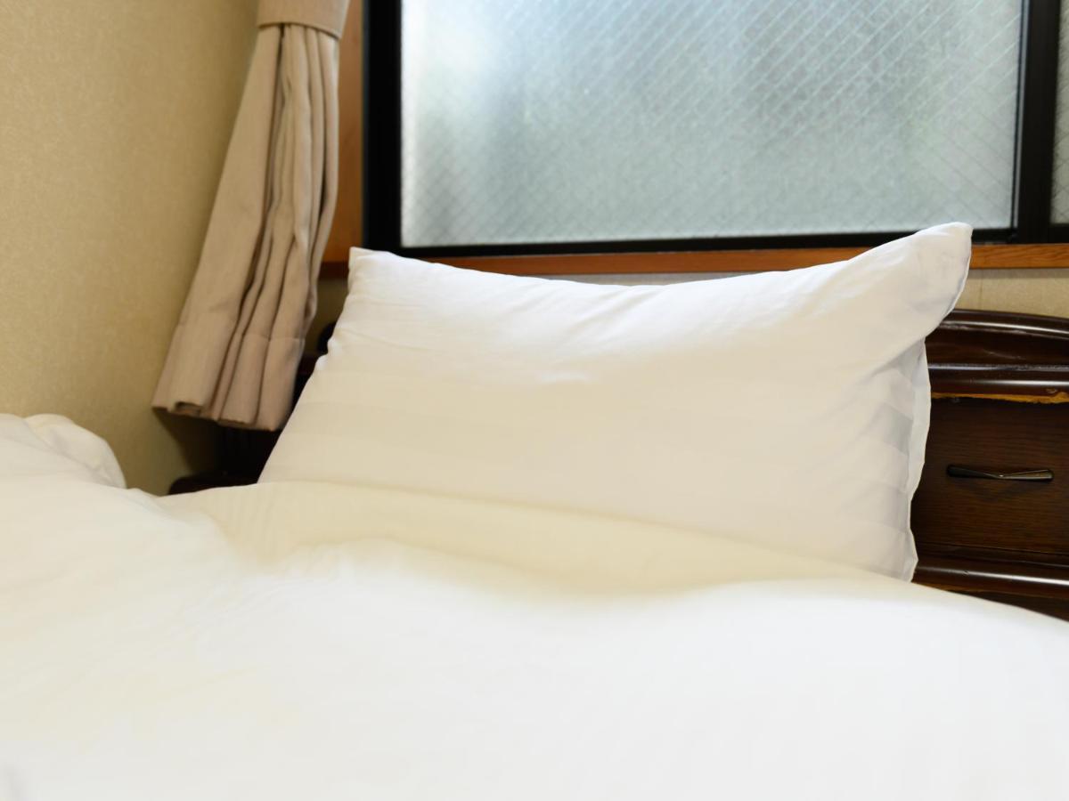 Tabist Tatsumi Business Hotel Matsusaka Buitenkant foto